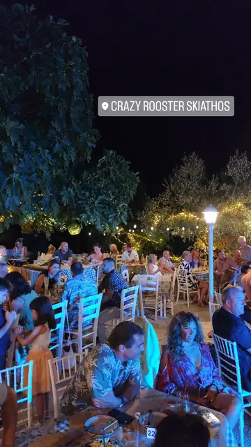 A packed evening in the garden under the trees