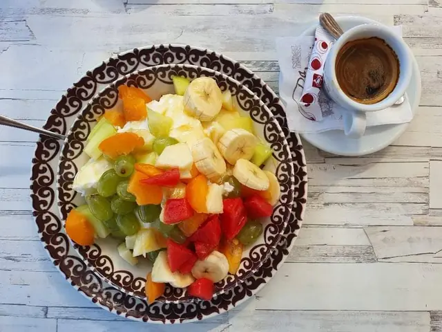 Fruit salad and a Greek coffee